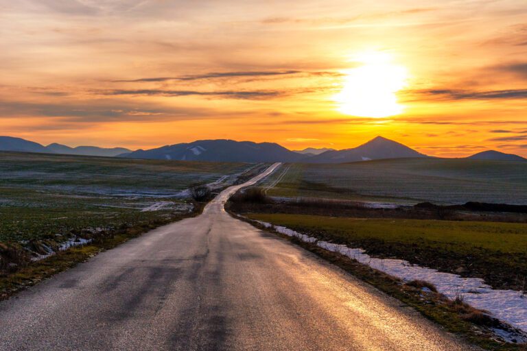 road mountain sunset